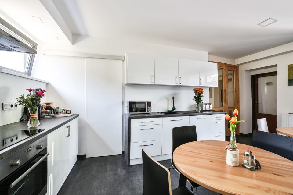 Triple Room, Balcony | Shared kitchen
