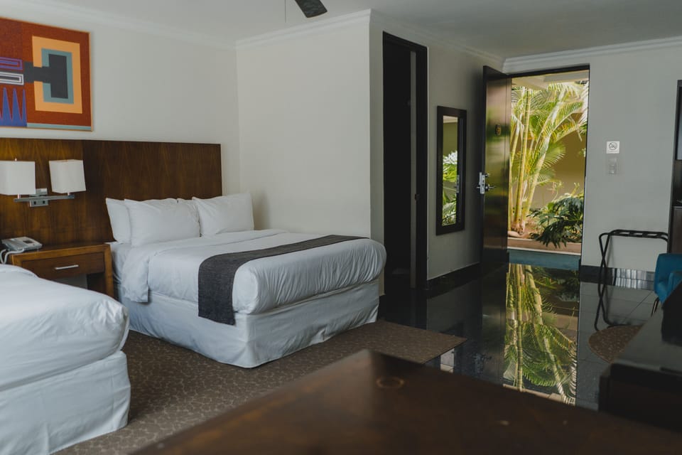 Superior Double Room, 2 Double Beds | Hypo-allergenic bedding, in-room safe, desk, blackout drapes