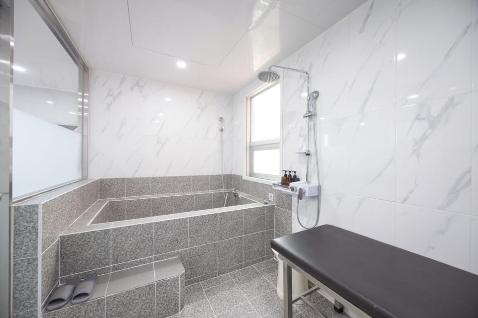 Deluxe Double Room / Terrace -Tile Bath with Hot Spring Water, Rate for 2, Extra Charges Apply | Bathroom | Combined shower/tub, deep soaking tub, hair dryer, towels