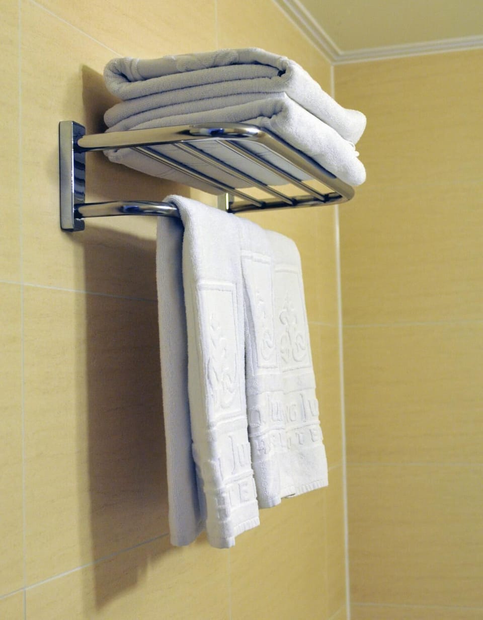 Hair dryer, bathrobes, slippers, towels