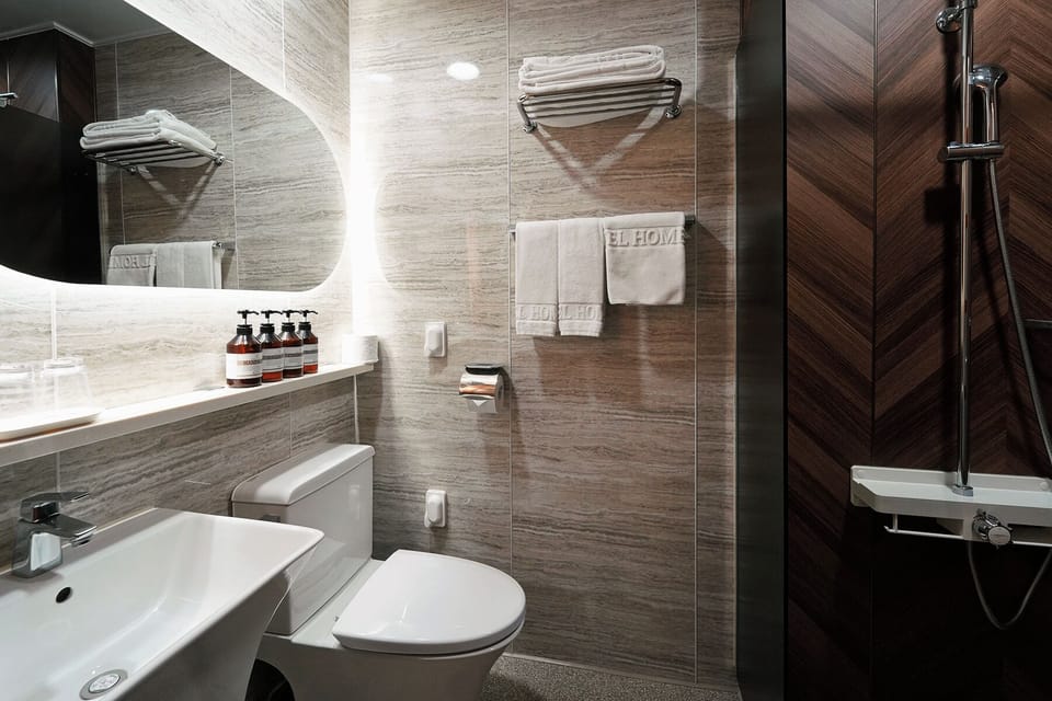 Hair dryer, bathrobes, slippers, soap