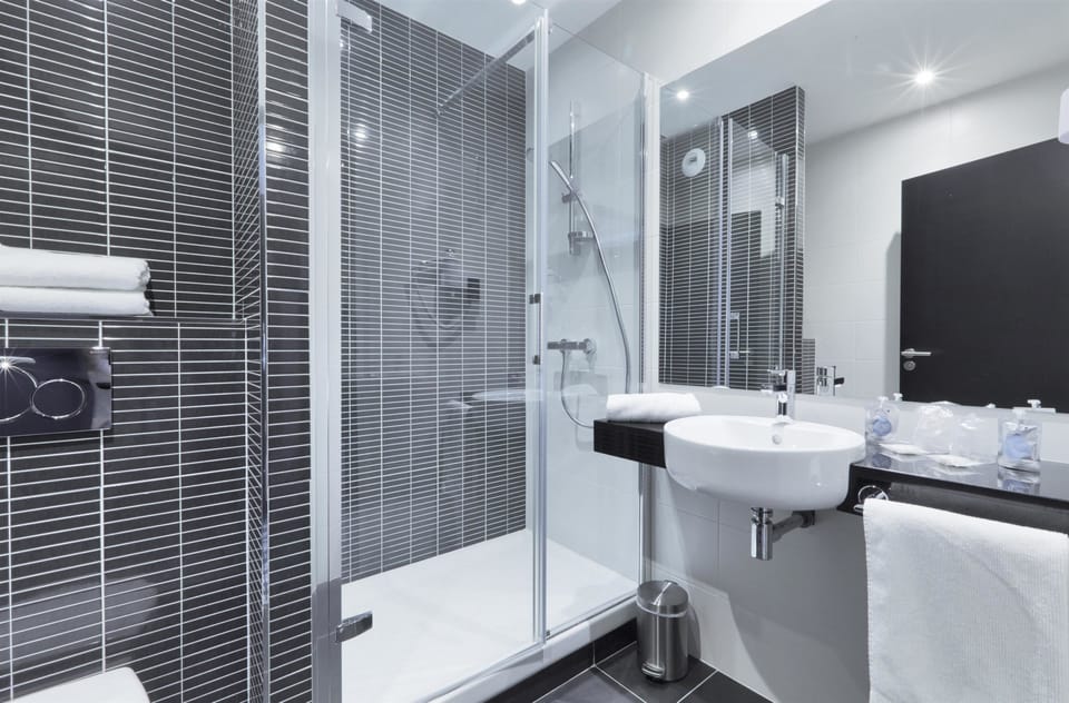 Premium bedding, desk, blackout drapes, soundproofing