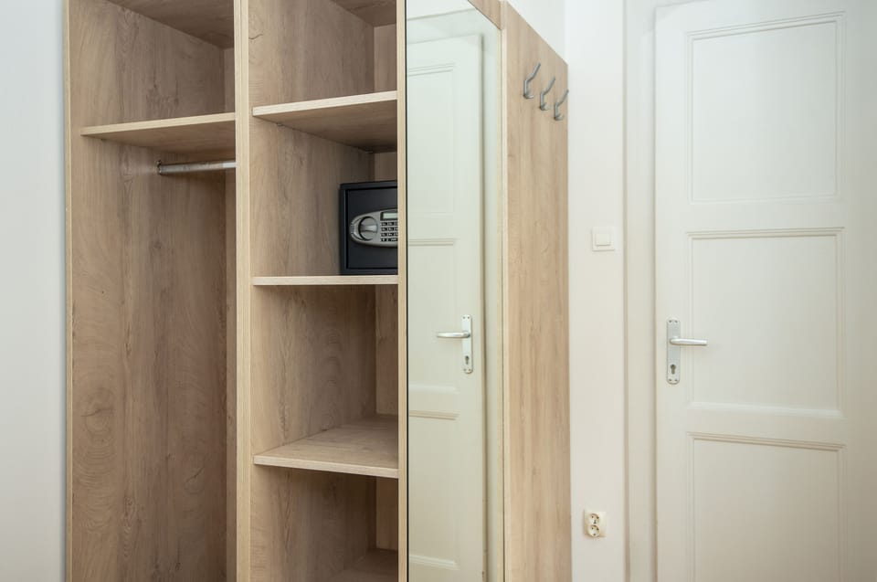 Apartment, 1 Bedroom | In-room safe, desk, laptop workspace, iron/ironing board (on request)