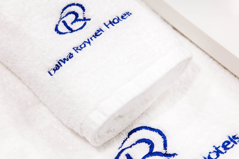 Combined shower/tub, free toiletries, hair dryer, slippers