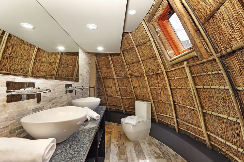 Traditional Room | Bathroom | Shower, rainfall showerhead, hair dryer, towels