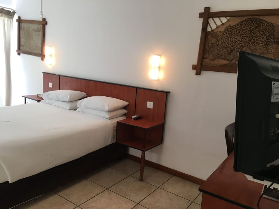 Executive Double Room | Minibar, in-room safe, desk, laptop workspace