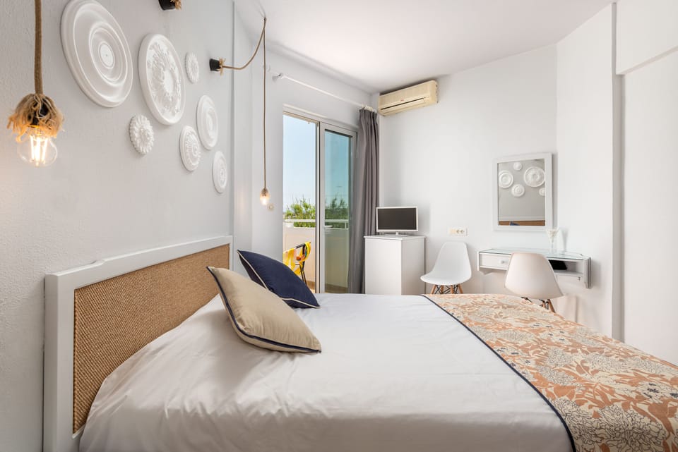 Family Room, 2 Bedrooms, Sea View | Laptop workspace, blackout drapes, iron/ironing board (on request)