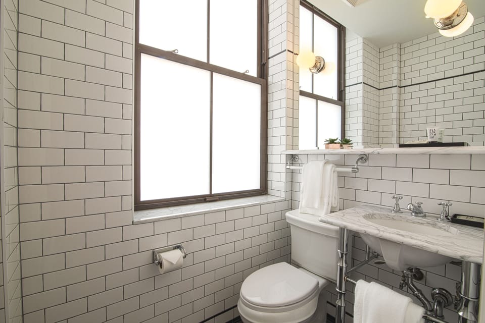 Suite, 2 Full Beds with Sofa Bed (Tribeca) | Bathroom | Combined shower/tub, designer toiletries, hair dryer, towels