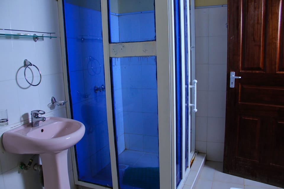 Rainfall showerhead, slippers, towels, soap