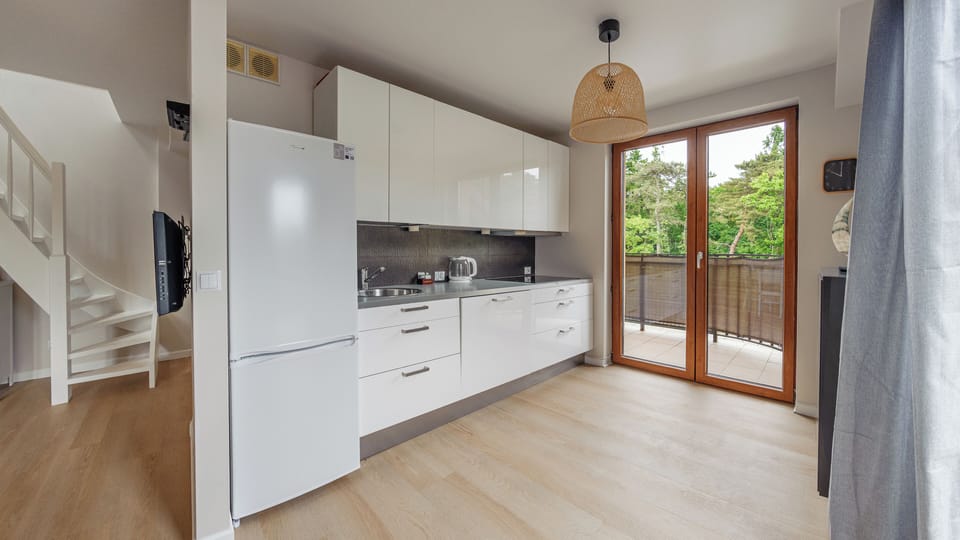 Apartment (11, ul. Wojska Polskiego 77) | Private kitchenette | Fridge, stovetop, dishwasher, espresso maker