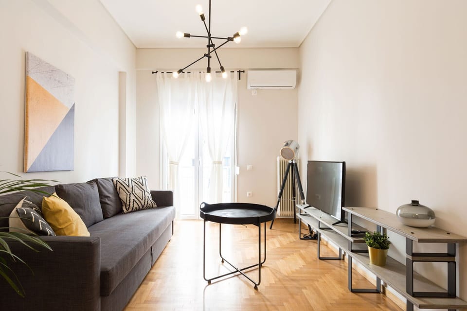 Apartment | Living area | 43-inch flat-screen TV with satellite channels, Smart TV, Netflix