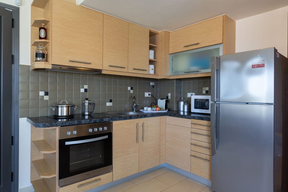 Deluxe Apartment, Private Pool (Dimitra) | Private kitchen | Full-size fridge, microwave, oven, stovetop