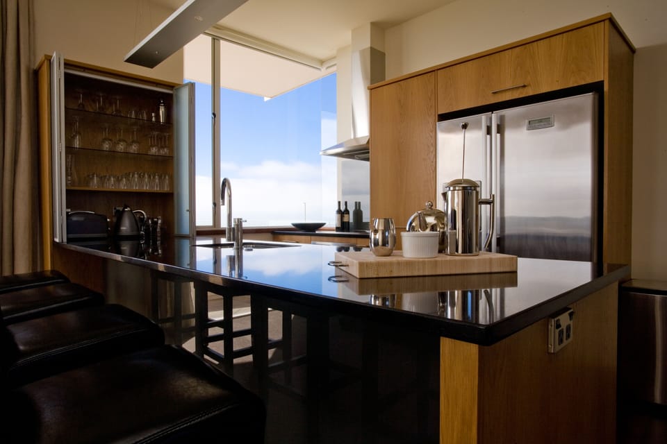 Cape View Penthouse | Private kitchen | Fridge, coffee/tea maker, cookware/dishes/utensils