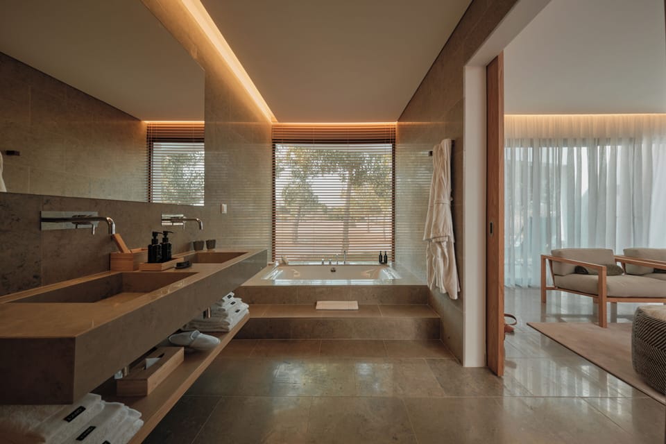 Sky View Junior Suite | Bathroom | Separate tub and shower, hair dryer, slippers, towels
