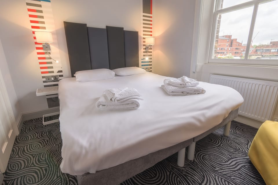 Double Room | 1 bedroom, desk, blackout drapes, iron/ironing board
