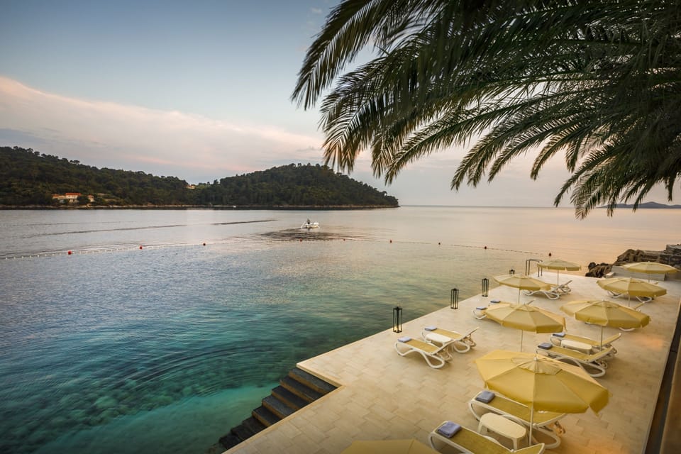 On the beach, sun loungers, beach umbrellas, beach towels