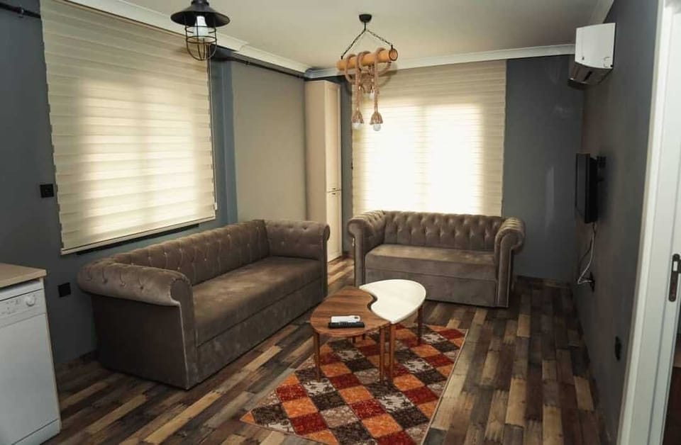 Apartment, 1 Bedroom | Living area | LCD TV