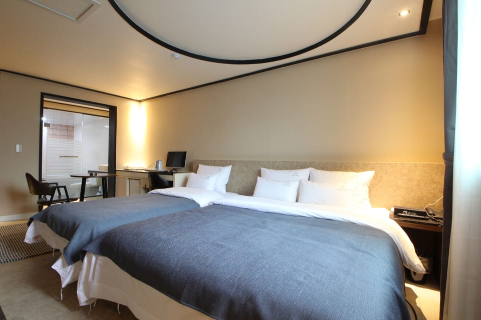 Twin Room | Blackout drapes, free WiFi, bed sheets