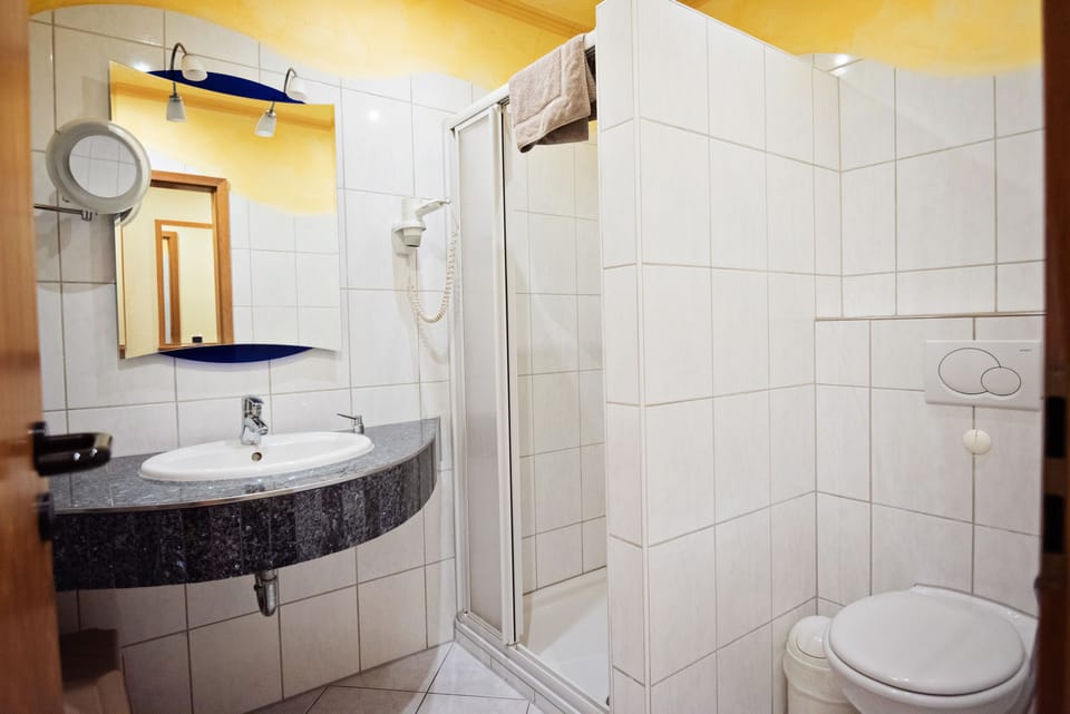 Shower, free toiletries, hair dryer, towels