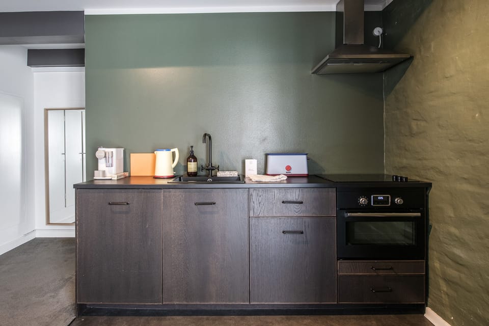 Exclusive Apartment | Private kitchen | Full-size fridge, microwave, oven, stovetop