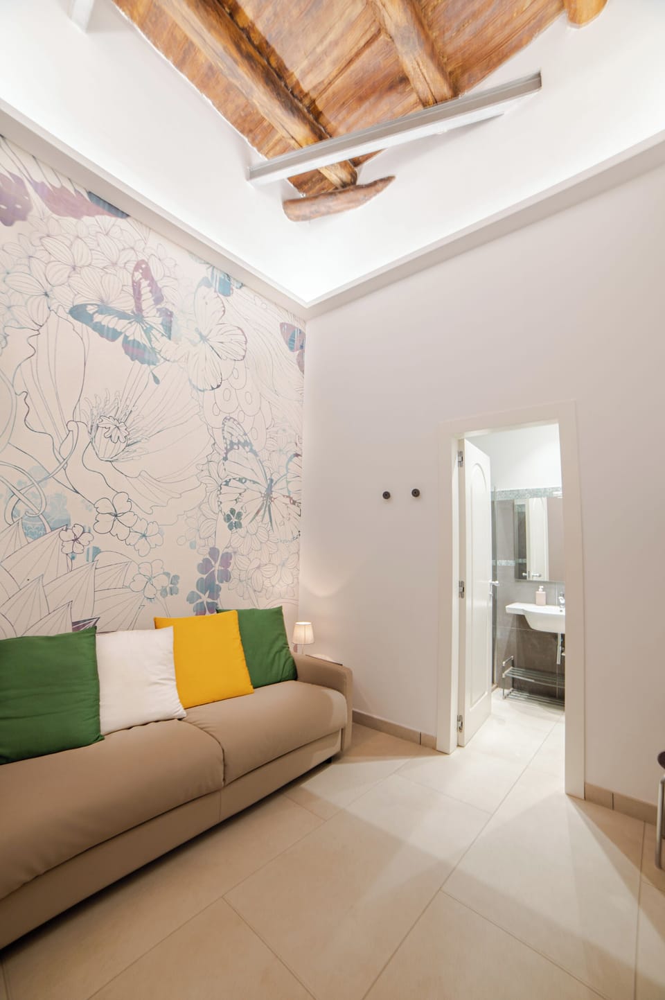 Deluxe Quadruple Room | Minibar, in-room safe, individually decorated, individually furnished