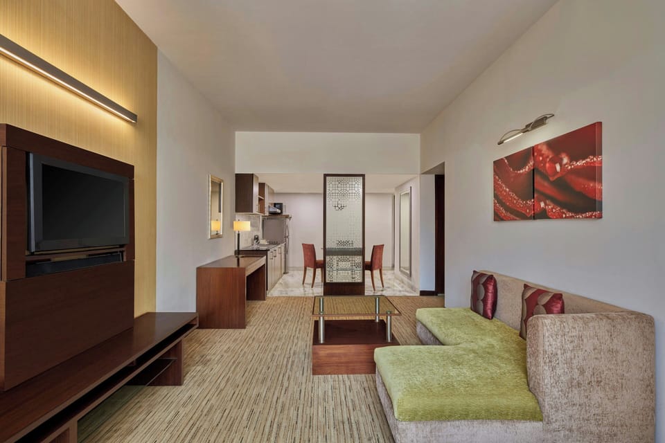 Club Apartment, 1 Bedroom | Living room | 32-inch LCD TV with digital channels, TV, DVD player