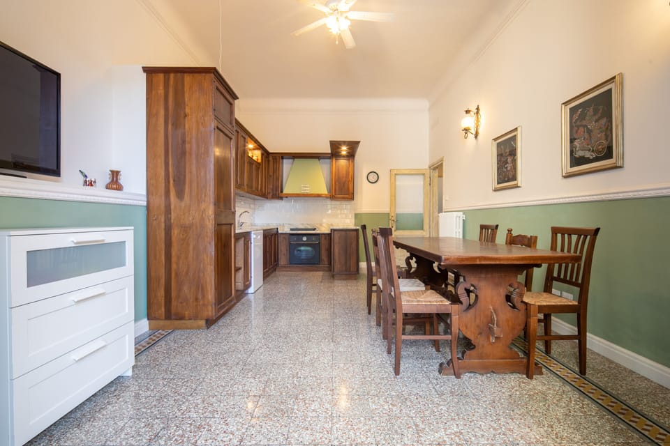 Comfort Apartment, 4 Bedrooms | Living area | Flat-screen TV