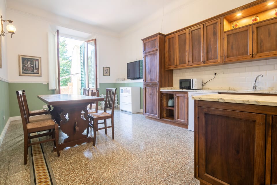 Comfort Apartment, 4 Bedrooms | Living area | Flat-screen TV