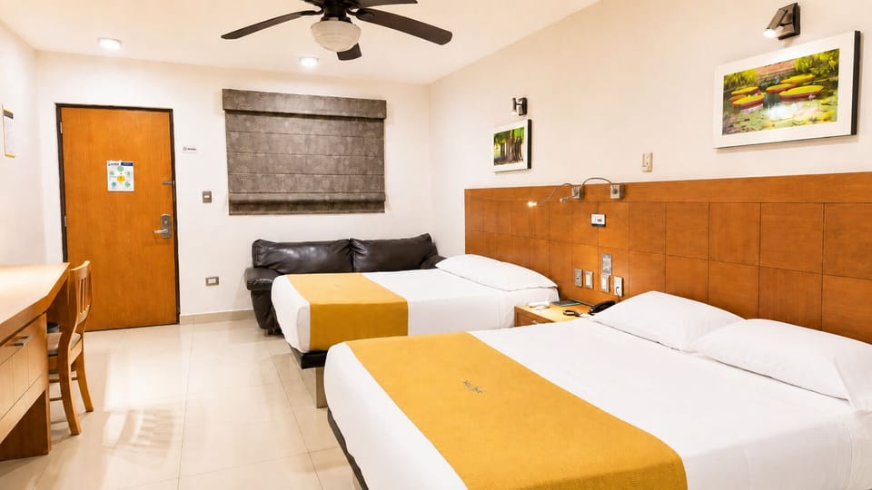 Deluxe Double Room, Multiple Bedrooms | Blackout drapes, soundproofing, free WiFi, bed sheets