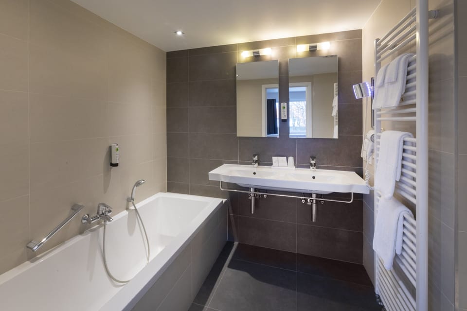 Family Room | Bathroom | Eco-friendly toiletries, hair dryer, towels, soap