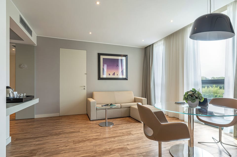 Suite | Living area | 50-inch LCD TV with digital channels, TV