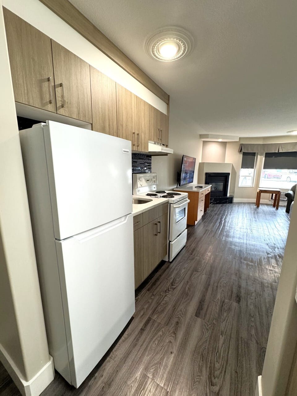 Studio, 1 Queen Bed, Fireplace | Private kitchen | Full-size fridge, microwave, oven, stovetop