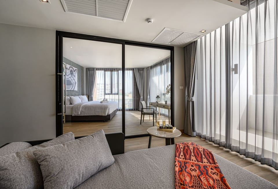 One Bedroom Suite | Premium bedding, in-room safe, individually decorated