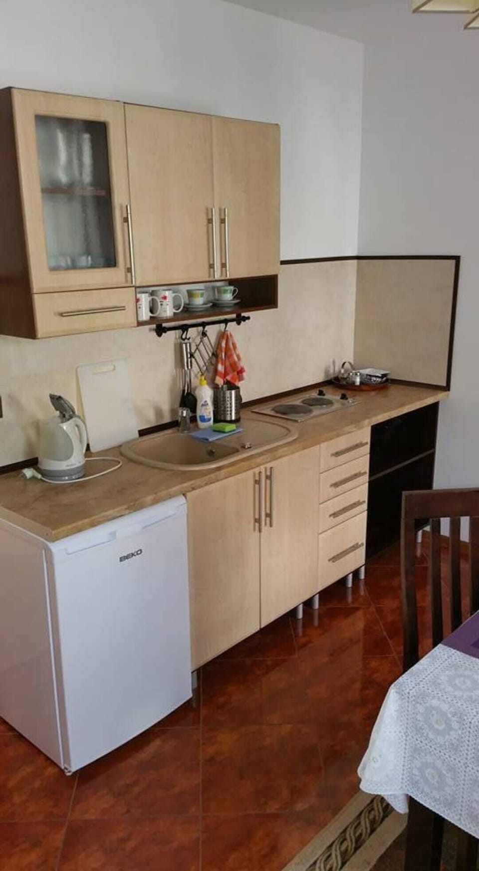 Apartment | Private kitchen | Fridge, stovetop, electric kettle, highchair
