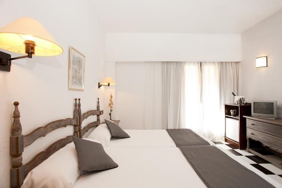 In-room safe, blackout drapes, iron/ironing board