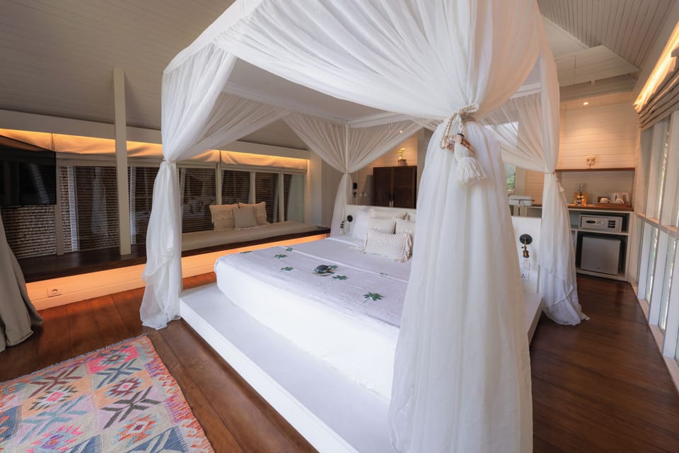Cabana with Free Minibar | Minibar, in-room safe, iron/ironing board (on request), WiFi (free)