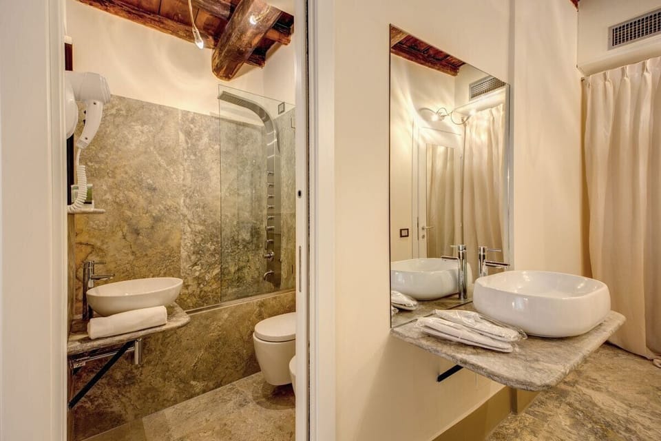 Shower, free toiletries, hair dryer, bidet