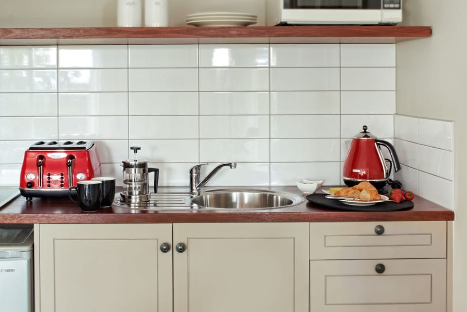 The Owner's Cottage | Private kitchenette | Full-size fridge, microwave, stovetop, espresso maker