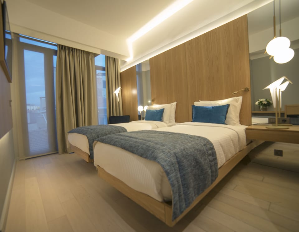 Standard Twin Room | Premium bedding, minibar, in-room safe, blackout drapes