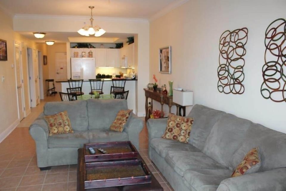 Condo, 2 Bedrooms, Balcony, Beach View (704) | Living area | Flat-screen TV