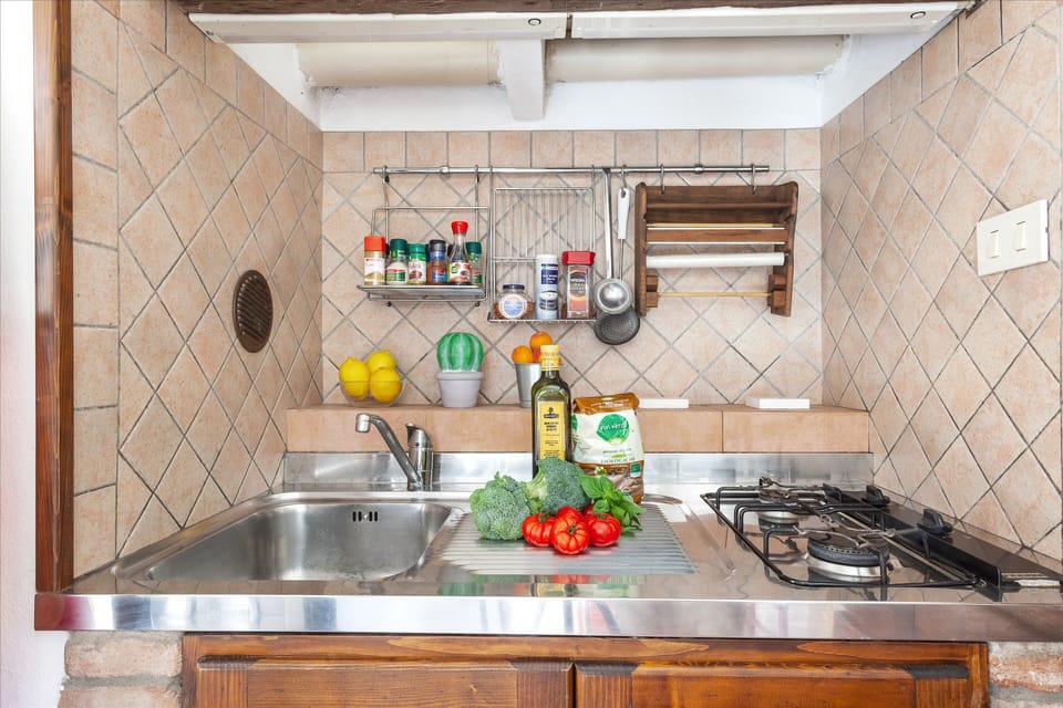 Apartment | Private kitchenette | Fridge, microwave, stovetop, coffee/tea maker