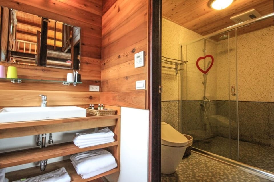 Standard Quadruple Room, Non Smoking | Bathroom | Shower, slippers, towels