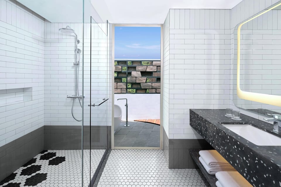 aloft, Loft, 1 King Bed | Bathroom | Free toiletries, hair dryer, slippers, bidet