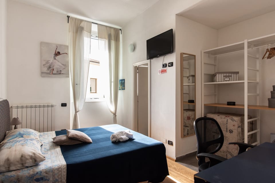 City Room | Premium bedding, memory foam beds, desk, soundproofing