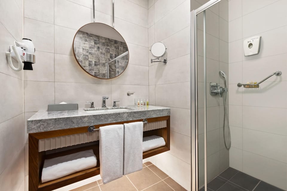 Shower, rainfall showerhead, eco-friendly toiletries, hair dryer