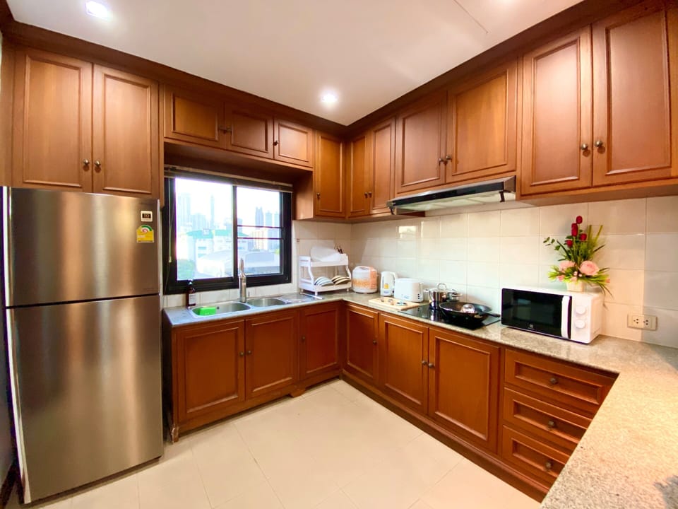 3 Bedrooms Apartment | Private kitchen | Cleaning supplies