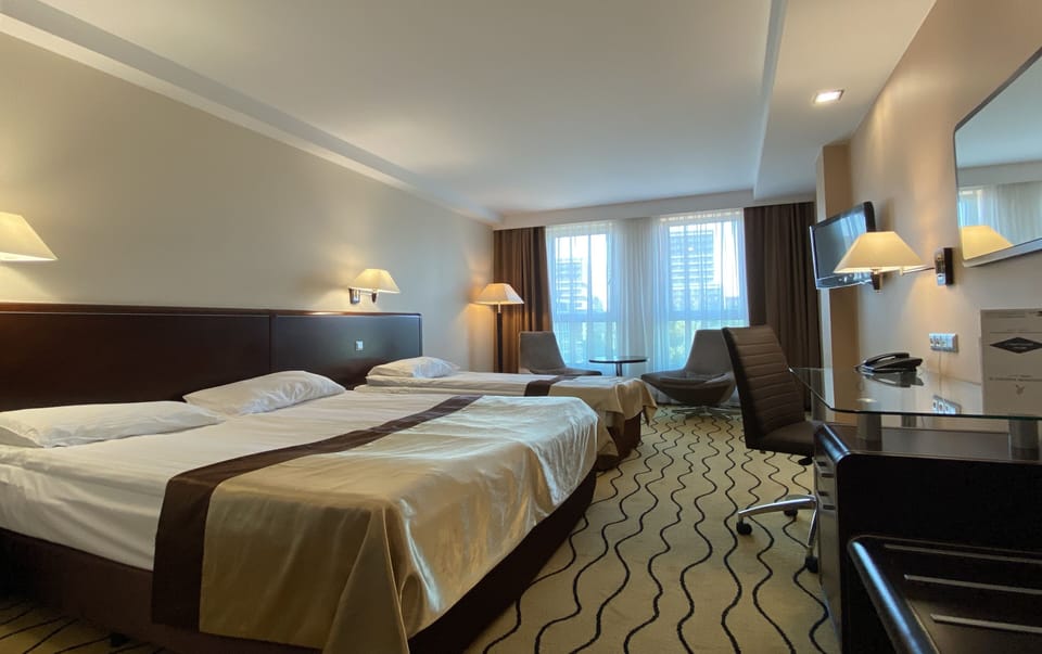 Comfort Triple Room | Premium bedding, Select Comfort beds, in-room safe, desk
