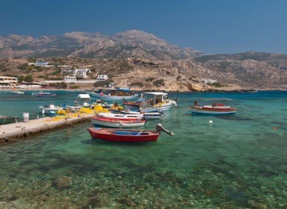 On the beach, sun loungers, beach umbrellas, beach towels