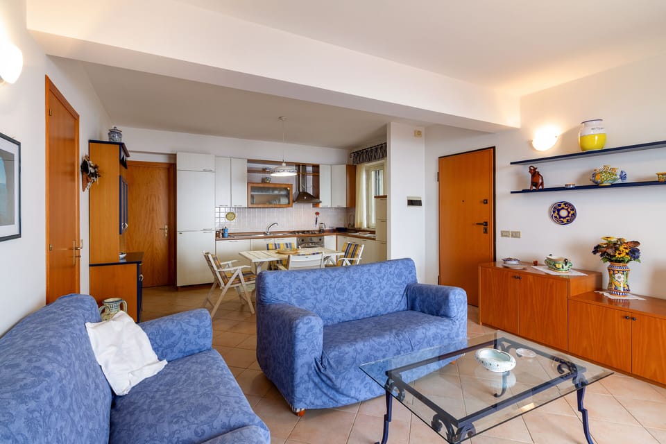 Apartment, 2 Bedrooms | Living area | Flat-screen TV