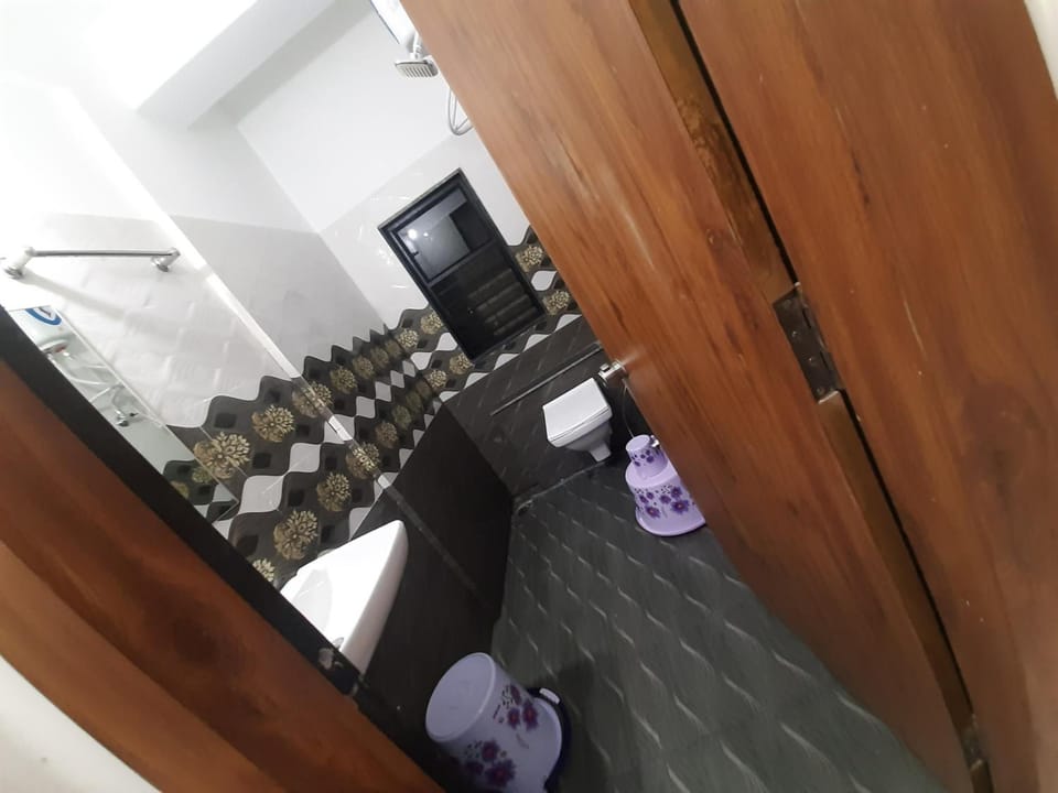 Shower, bathrobes, slippers, towels